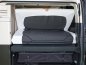 Preview: Bild von einem aufgeklappten iXTEND Faltbett im Mercedes-Benz V-Klasse Marco Polo mit dem Spannbettlaken darauf